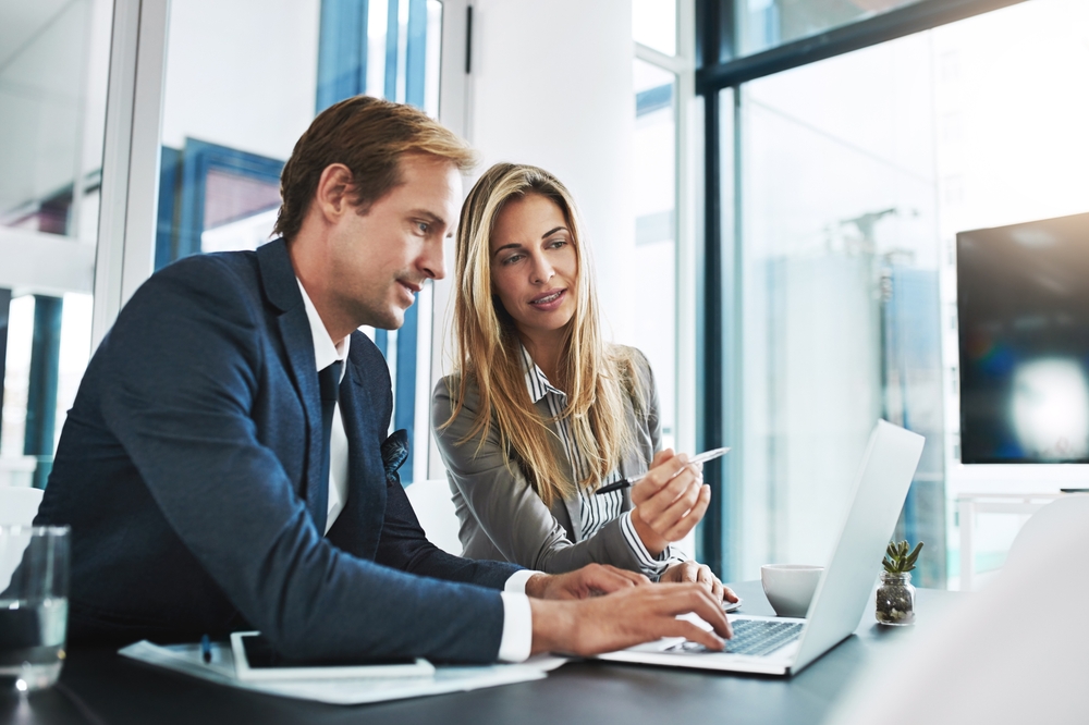 Man,,Woman,And,Laptop,With,Corporate,Partner,,Planning,Or,Typing