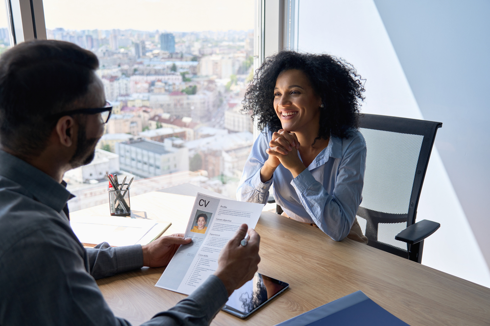 Friendly,Interview,Between,Indian,Businessman,Hr,Director,Holding,Paper,Cv