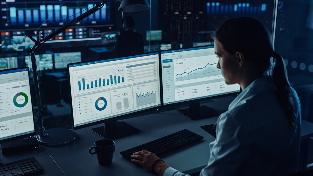 Professional,Financial,Data,Analysts,Working,In,A,Modern,Monitoring,Office