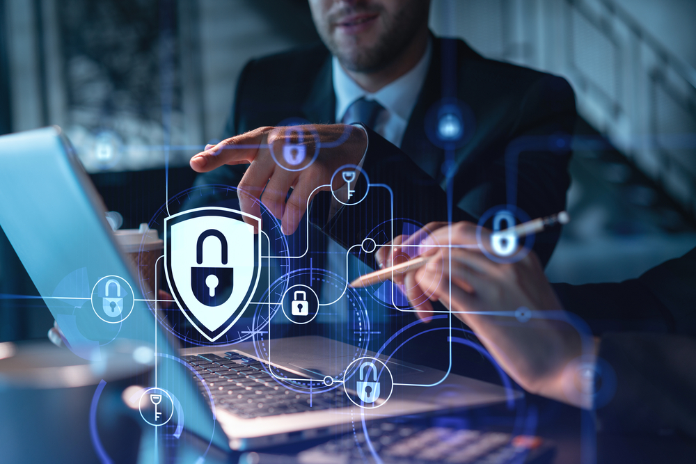 Two,Colleagues,Working,Together,To,Protect,Clients,Confidential,Information,And